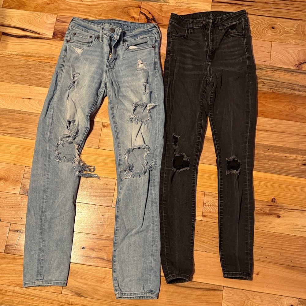 2 Pairs of American Eagle Outfitters Light Blue and Black Distressed Jeans